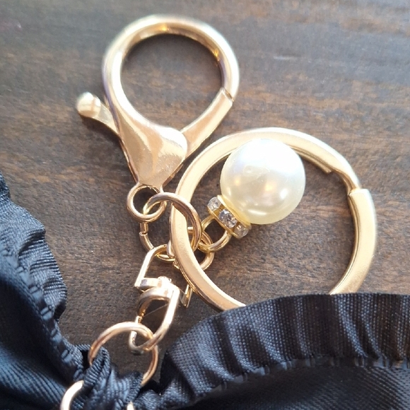 Elegant Black and Gold Bow Bag Charm - Picture 3 of 5